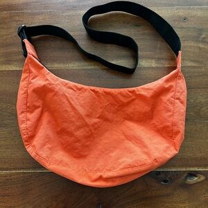BAGGU Orange Crossbody Bag with Crescent Shape